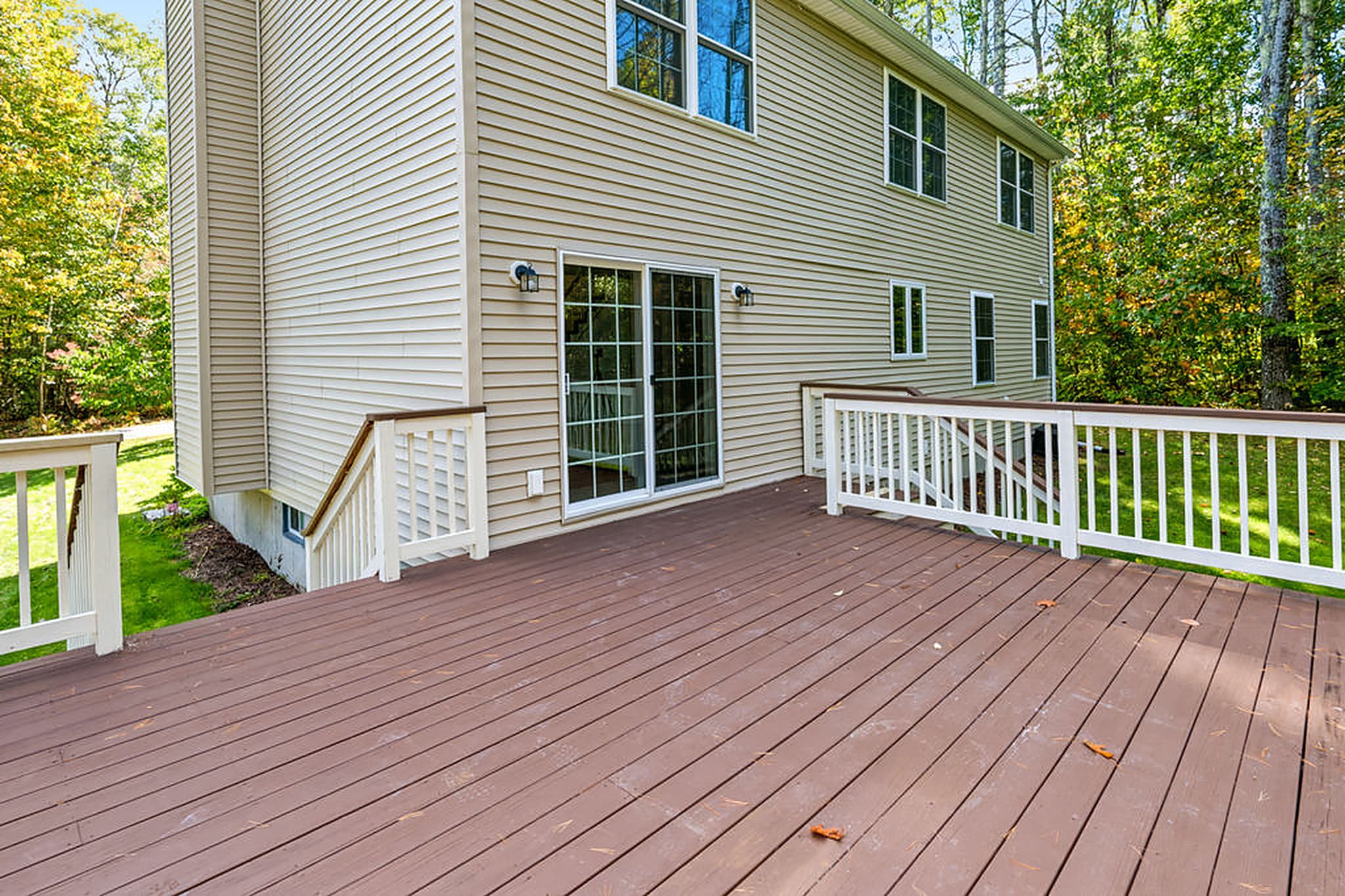 Rear deck looking at the yard and woods